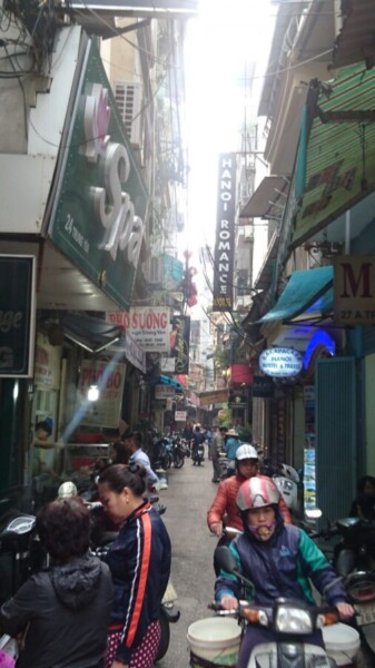 Old town Hanoi is a maze of narrow streets in which every inch is choked with street traders and scooters