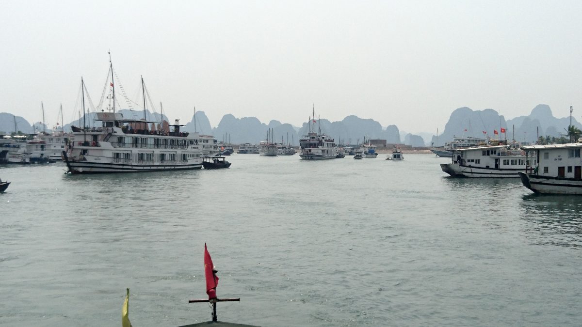 The tour boats coming out of Halong bay with their tourist cargoes. This last leg was a little manic and felt less like a cruise and more like an evacuation