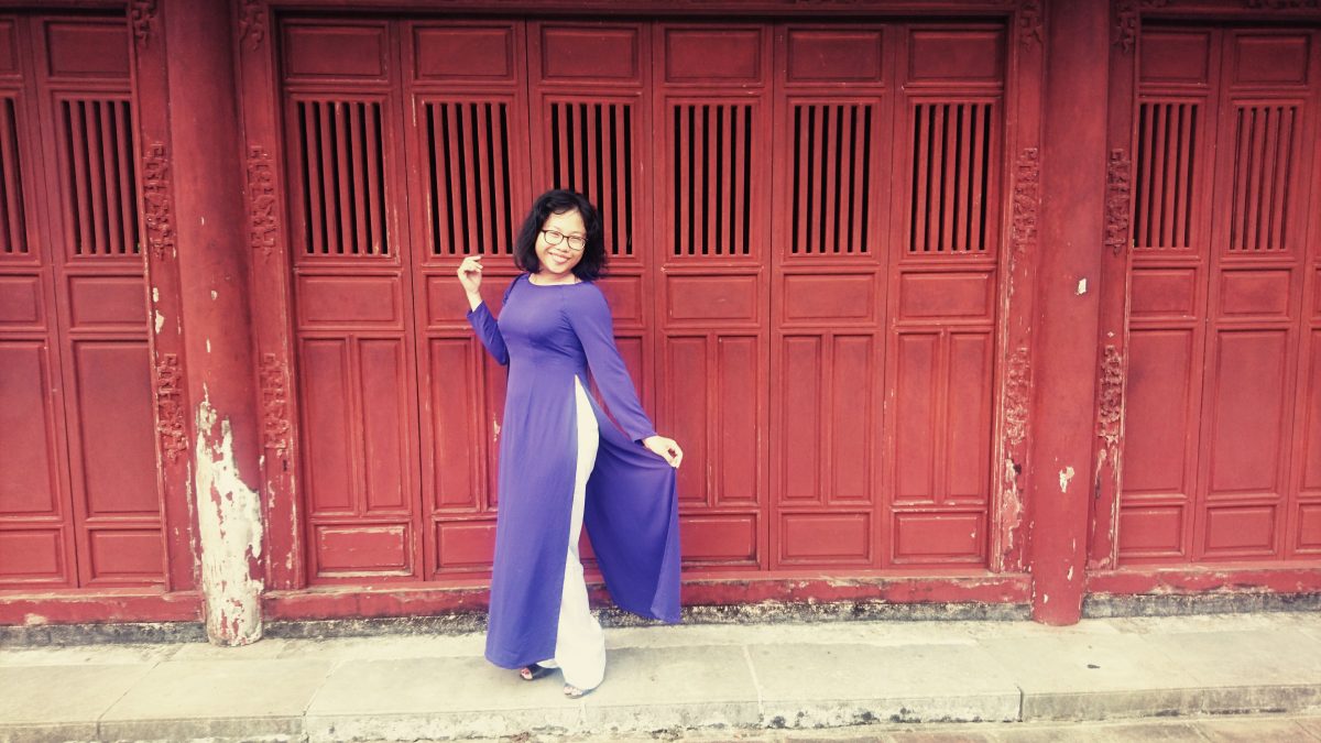 For my tour of Vietnam's ancient capital city, Hue, Ti donned her traditional, silk áo dài dress